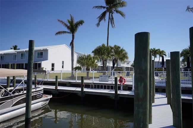 Dock with view of corner condo | Image 6