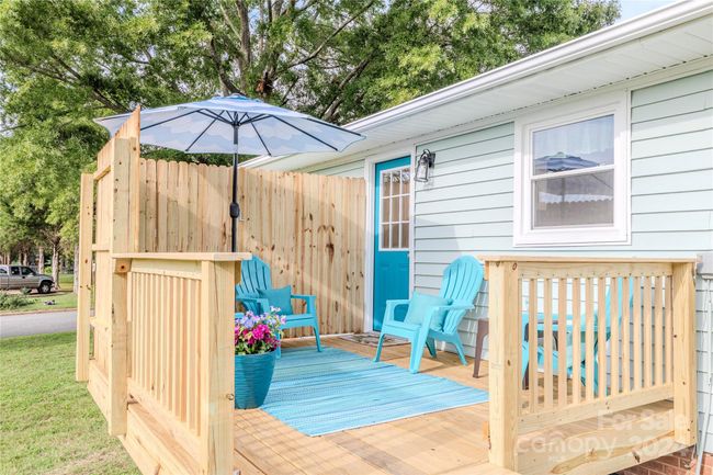 The deck has a privacy wall added for shade and to sit and sip in your pjs in the morning! | Image 41