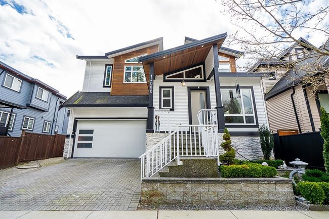 14086 58 A Avenue, House other with 6 bedrooms, 4 bathrooms and 4 parking in Surrey BC | Image 1