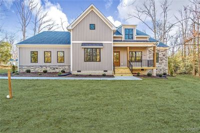 Picture of farmhouse elevation. Base price includes traditional elevation. | Image 1