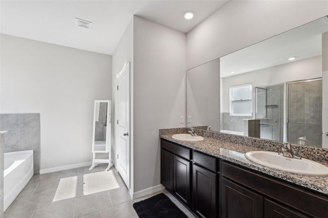 9804 Rowing Dale Bnd, House other with 4 bedrooms, 3 bathrooms and null parking in WESLEY CHAPEL FL | Image 38