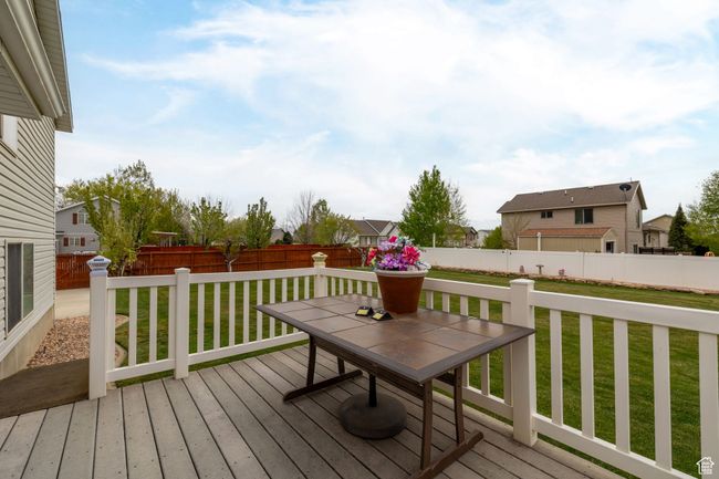 Deck with a lawn and a fenced backyard | Image 52
