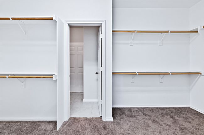 Spacious closet featuring carpet flooring | Image 18