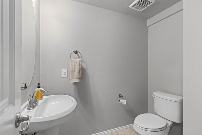 Half bath located in back hallway of home | Image 12