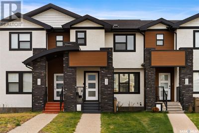 7905 Canola Ave, Townhouse with 3 bedrooms, 3 bathrooms and null parking in Regina SK | Image 1