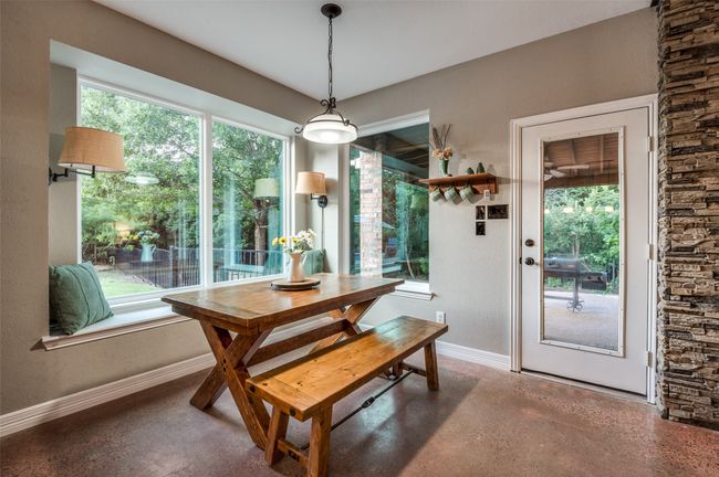 Breakfast Room w window seat, door to back covered patio | Image 19