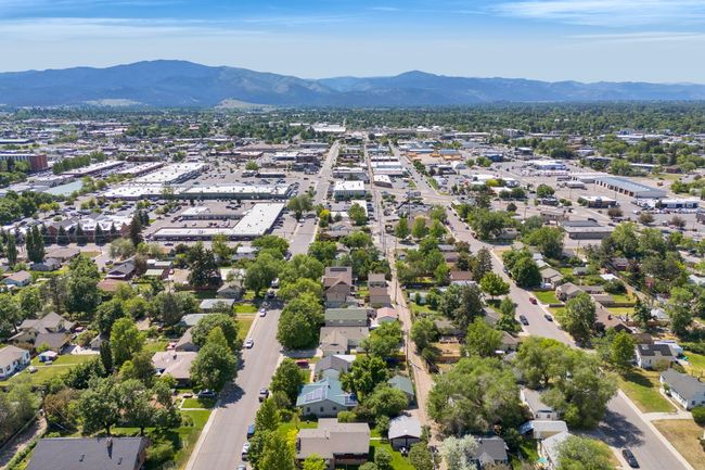 Aerial view of property and surrounding area with a mountain backdrop and nearby suburban area | Image 55