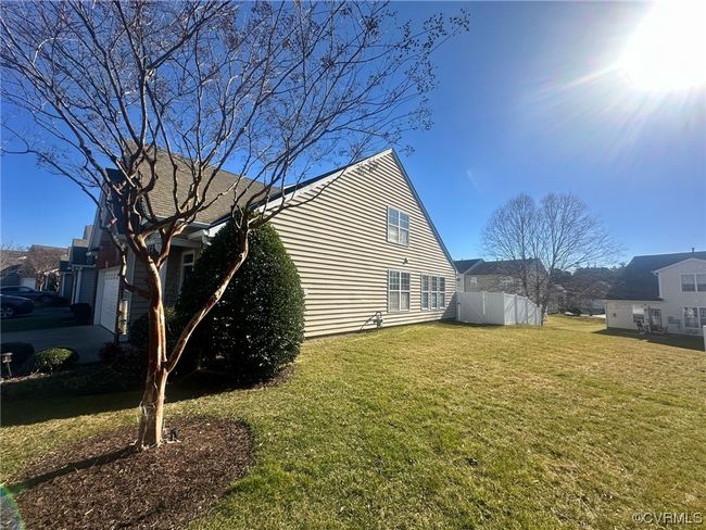 View of side of property with a yard | Image 26