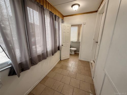 15 Mirin Ave, Roosevelt, NY, 11575-1603 | Card Image