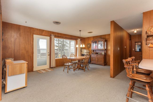 Dining room can access right out the backyard for grilling and lake tiem | Image 12