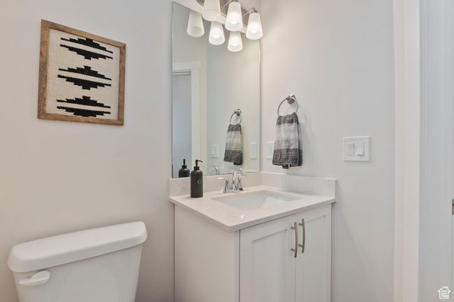 Half bath with toilet and vanity | Image 12