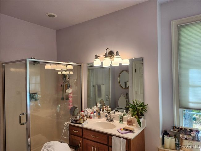 Full bathroom featuring vanity and a shower stall | Image 29