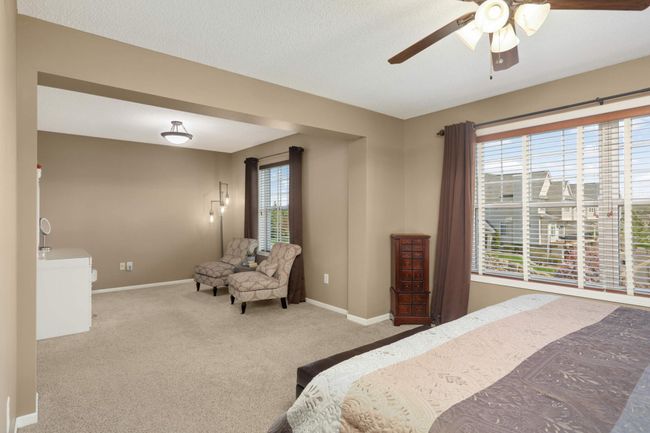 Primary bedroom with sitting area | Image 23