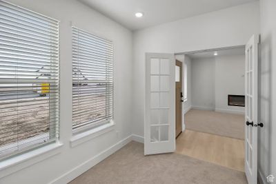 Hall with light wood-type flooring | Image 3