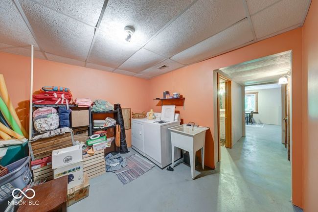 washroom featuring washer and clothes dryer | Image 23