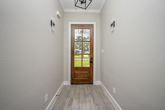 Greeting You At The Front Entrance Is A Beautiful & Modern Glass Window Front Door. The Foyer Is Also A Nice Touch That Gives A Peak Inside The Home Before Entering The Main Areas | Image 5