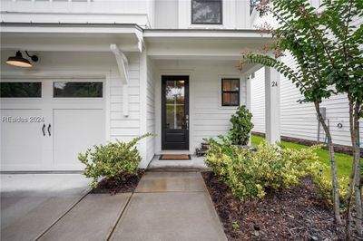 Entrance walkways to front porch and garage | Image 2