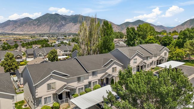 Mountain view featuring nearby suburban area | Image 27