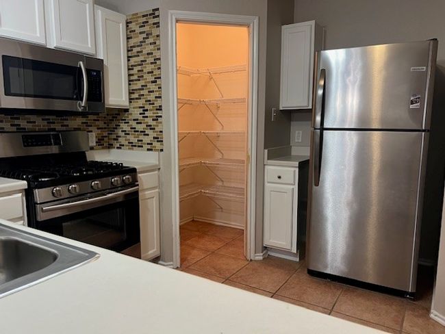 184 Dandelion Loop, House other with 3 bedrooms, 2 bathrooms and null parking in Kyle TX | Image 5
