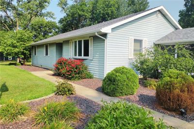 Single story home featuring a front lawn | Image 1