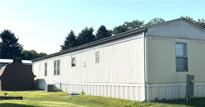 Back of mobile home & shed. | Image 2