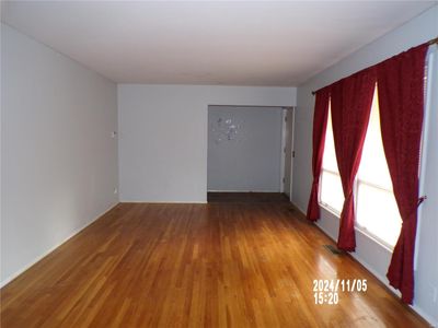 Empty room featuring wood-type flooring | Image 2