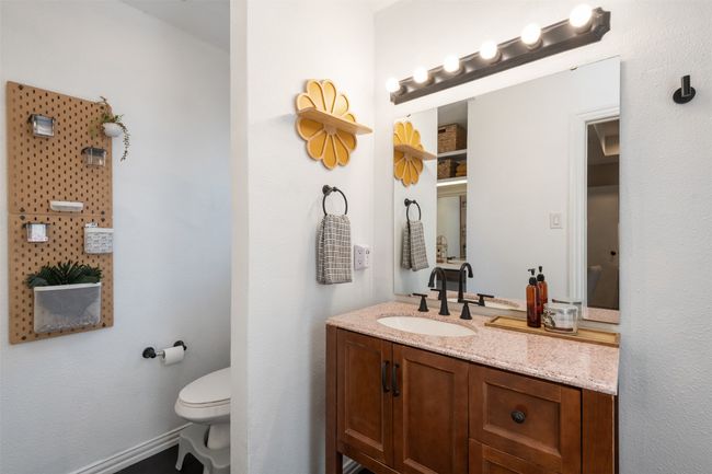 Bathroom featuring vanity and toilet | Image 17