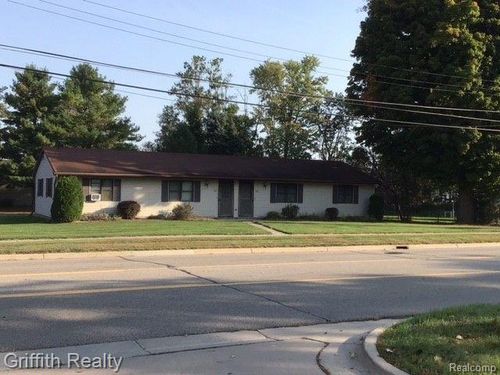 330 and 332 Garden Lane, Fowlerville Village, MI, 48836 | Card Image