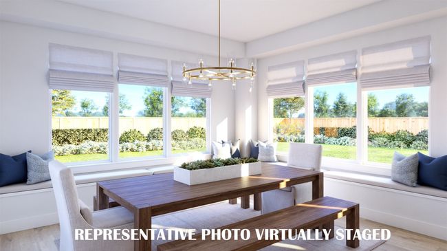 With windows everywhere you look, this dream dining room is the perfect place to host grand dinner parties or cozy family gatherings. REPRESENTATIVE PHOTO VIRTUALLY STAGED | Image 10