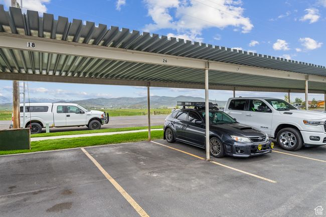 Covered parking lot with a mountain view | Image 25