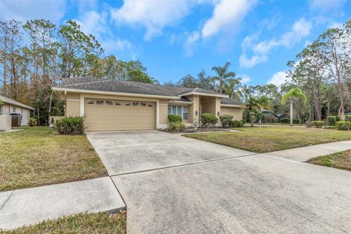 599 Centerwood Dr, TARPON SPRINGS, FL, 34688-7218 | Card Image