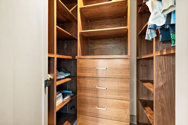 View of spacious closet | Image 18