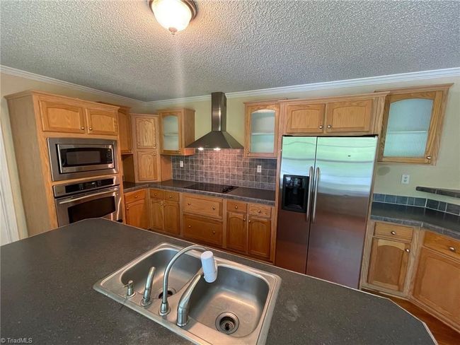 8004 Smithstone Ct, House other with 3 bedrooms, 2 bathrooms and null parking in Summerfield NC | Image 9