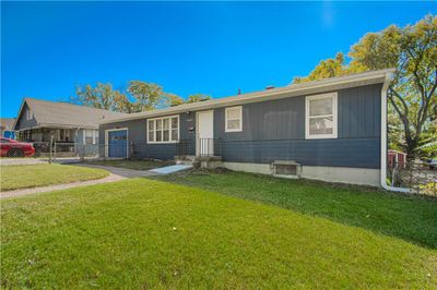 View of front facade with a front yard | Image 2