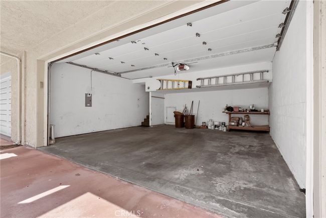 Great attached 2 car garage with special underground storage....tons of it!! | Image 36