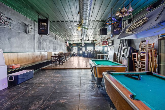 Rec room with ceiling fan and pool table | Image 14