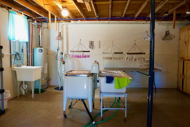 Below grade area featuring water heater | Image 18