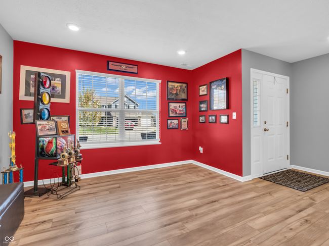 entrance foyer featuring recessed lighting, wood finished floors, and baseboards | Image 5