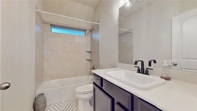Full bathroom featuring tub / shower combination and vanity | Image 19