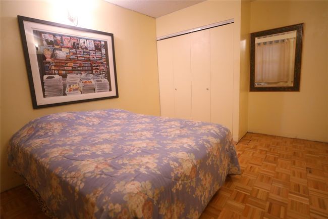 Bedroom with a closet | Image 23