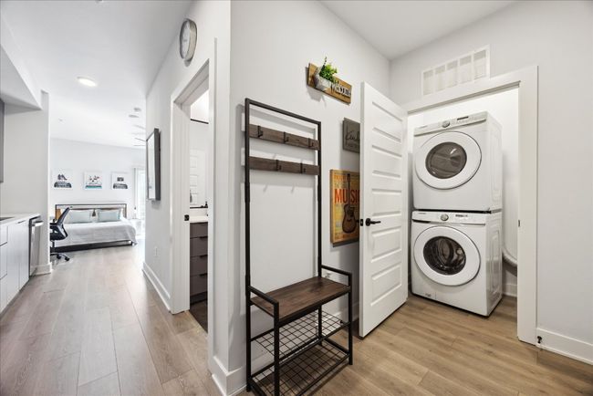 Laundry closet with extra storage space | Image 13