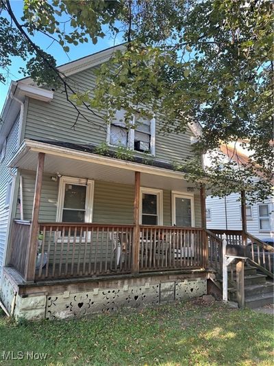 View of front of property featuring a porch | Image 1