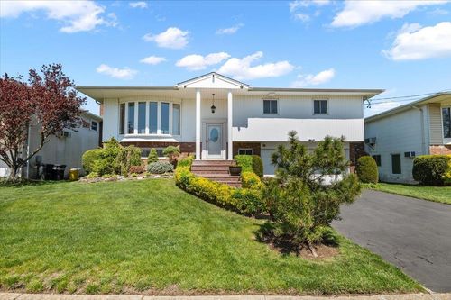 566 Howard Ave, Woodmere, NY, 11598-2353 | Card Image