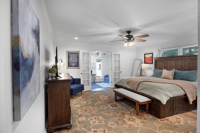 Bedroom featuring crown molding, recessed lighting, a ceiling fan, and french doors | Image 15