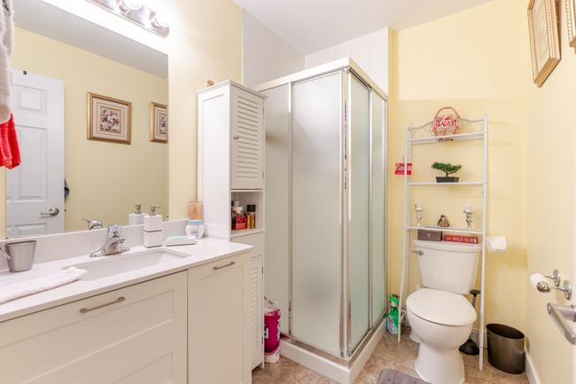 Full bathroom featuring vanity and a stall shower | Image 27