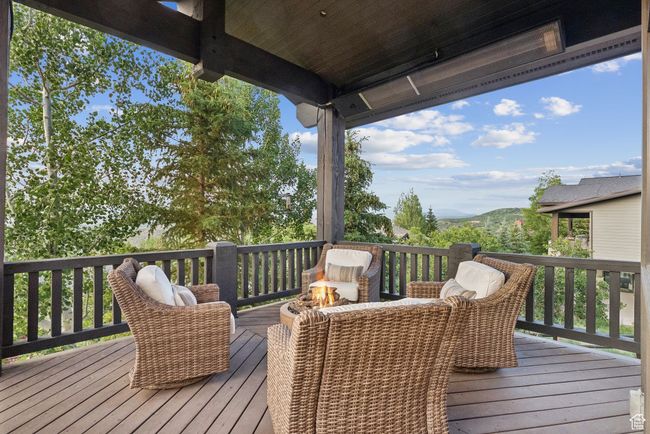 Wooden deck featuring a mountain view | Image 32