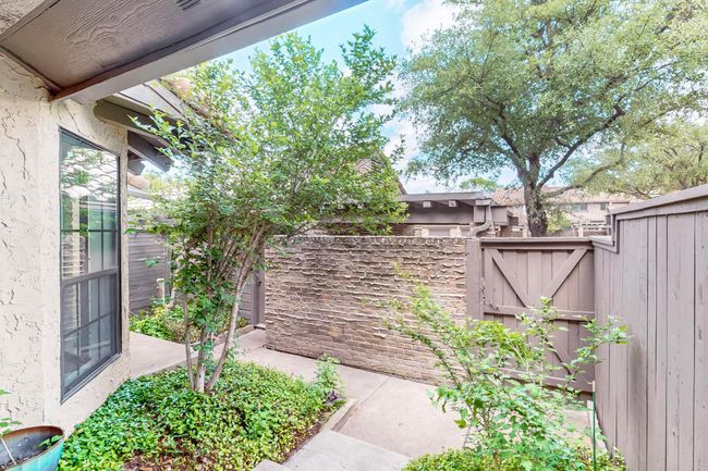 View of yard featuring fence and a gate | Image 5