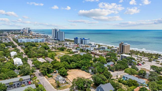 View of urban area with a nearby body of water | Image 7