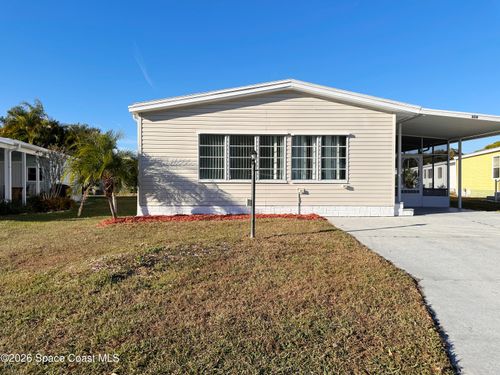 606 Dolphin Cir, Barefoot Bay, FL, 32976-2598 | Card Image