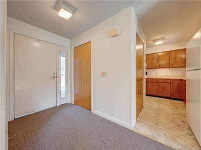 Entryway with closet | Image 2